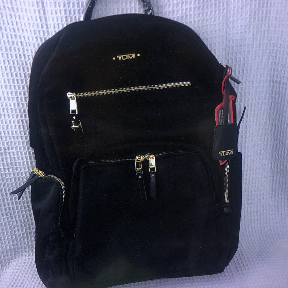 Tumi Black and Gold Men's Backpack